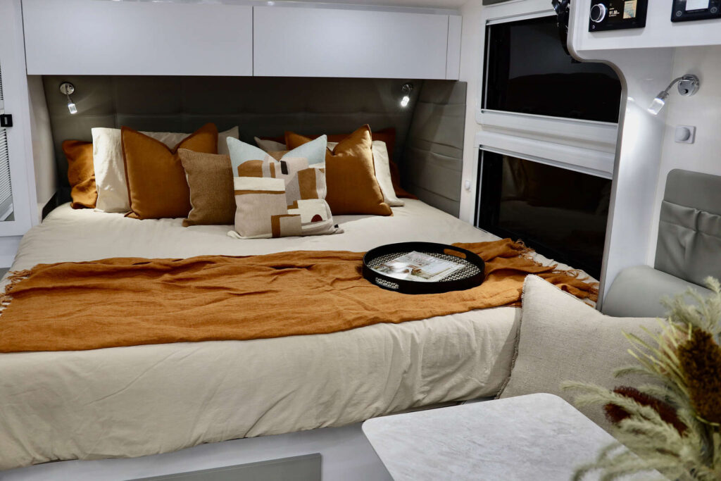 Beautiful King size bed inside a luxuriously designed caravan