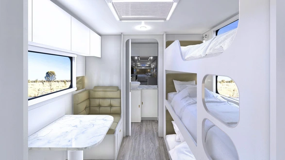 3 bunks on doorside, desk on roadside and rear en-suite