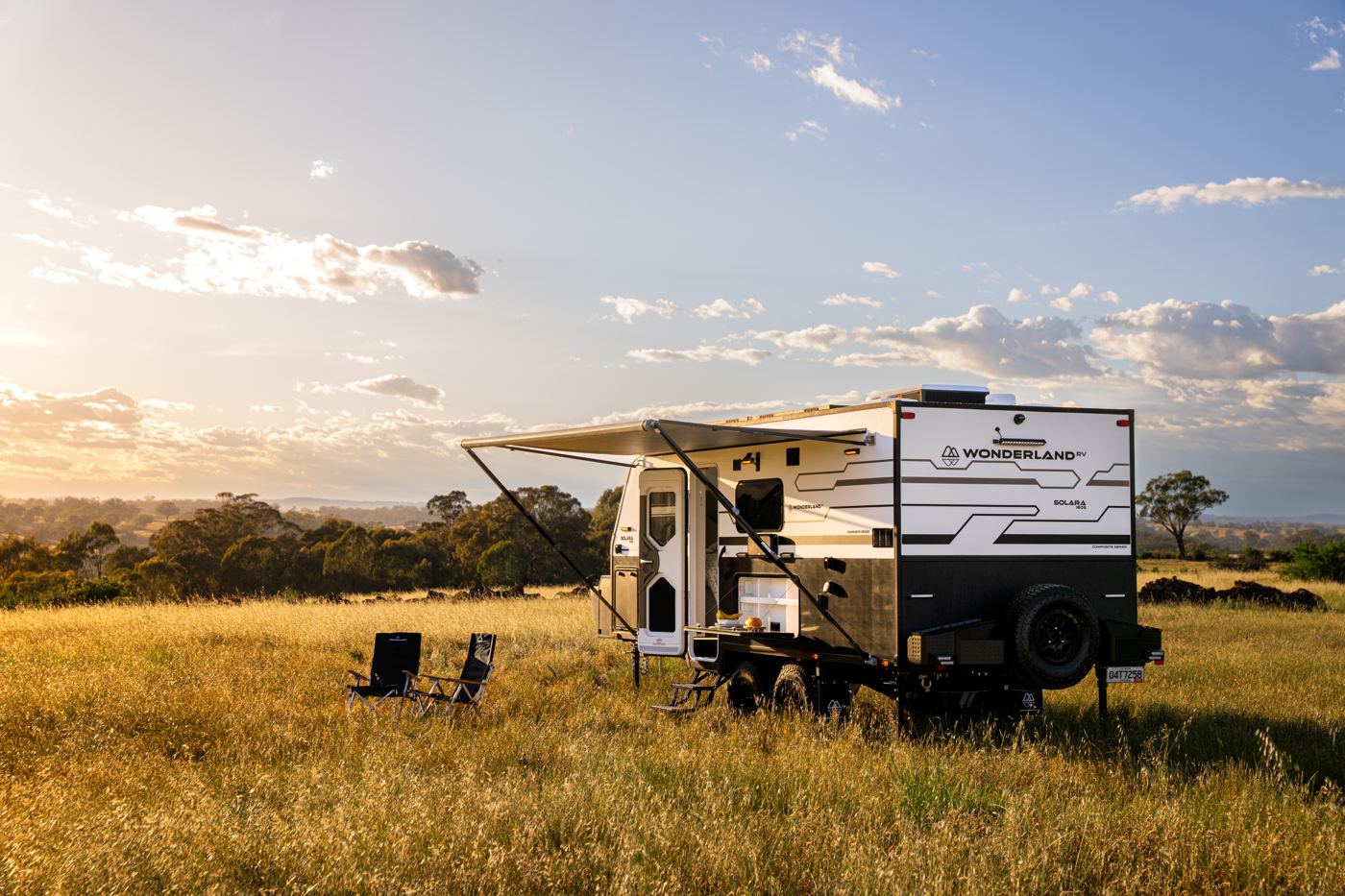 Wonderland RV Solara off-road caravan set up in an open field