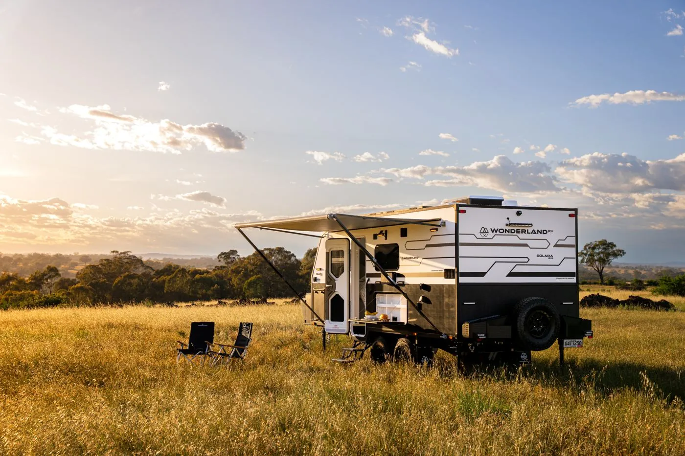 Wonderland RV Solara off-road caravan set up in an open field