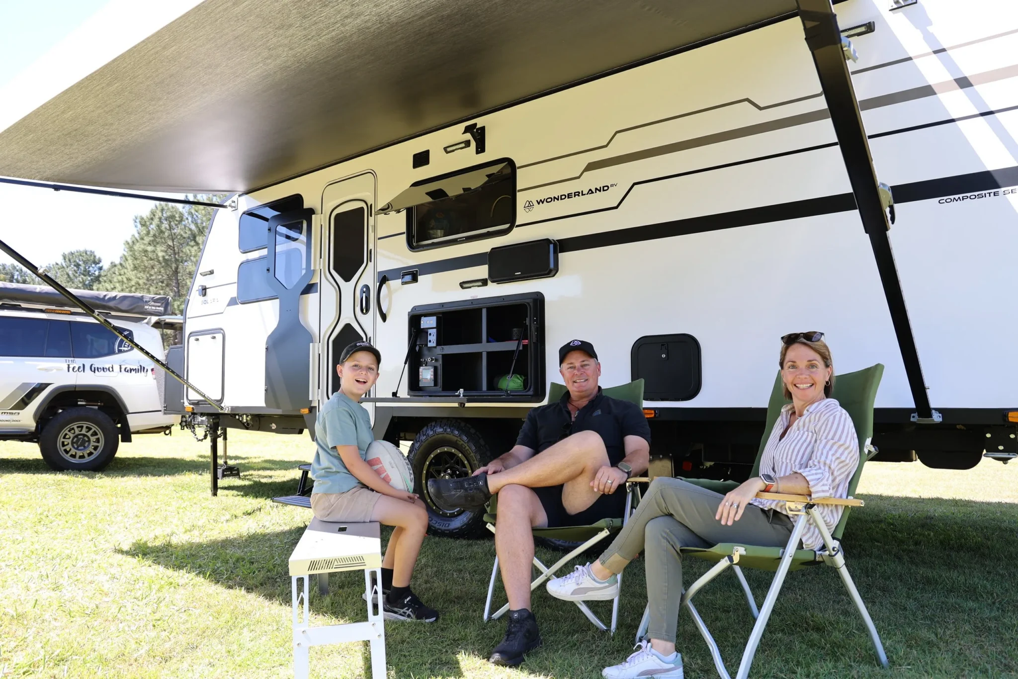 Katie, Paul and Jasper of The Feel Good Family with their Wonderland RV Solara