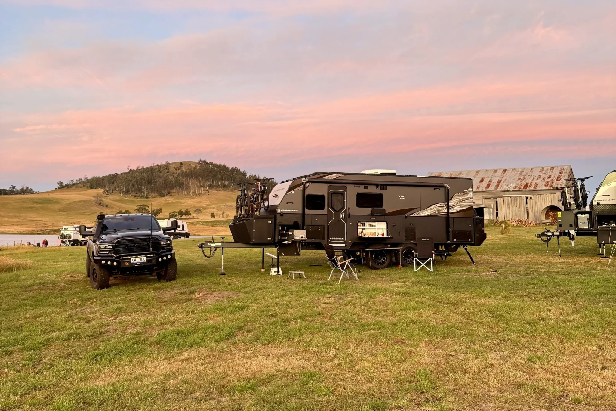 Livin In Sanity&rsquo;s Wonderland RV XTR at a paddock camp at sunset