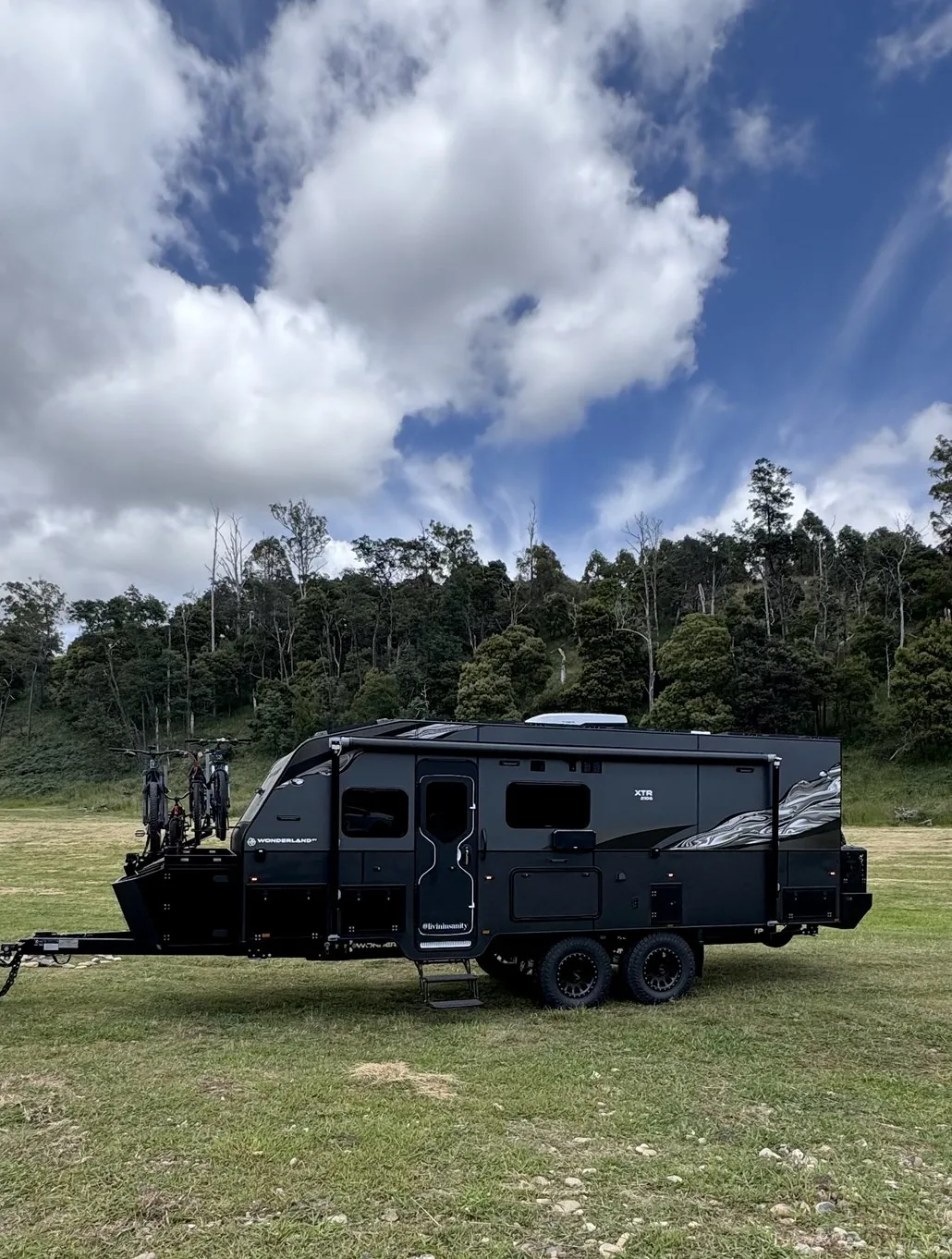 Livin In Sanity&rsquo;s XTR parked in a green paddock