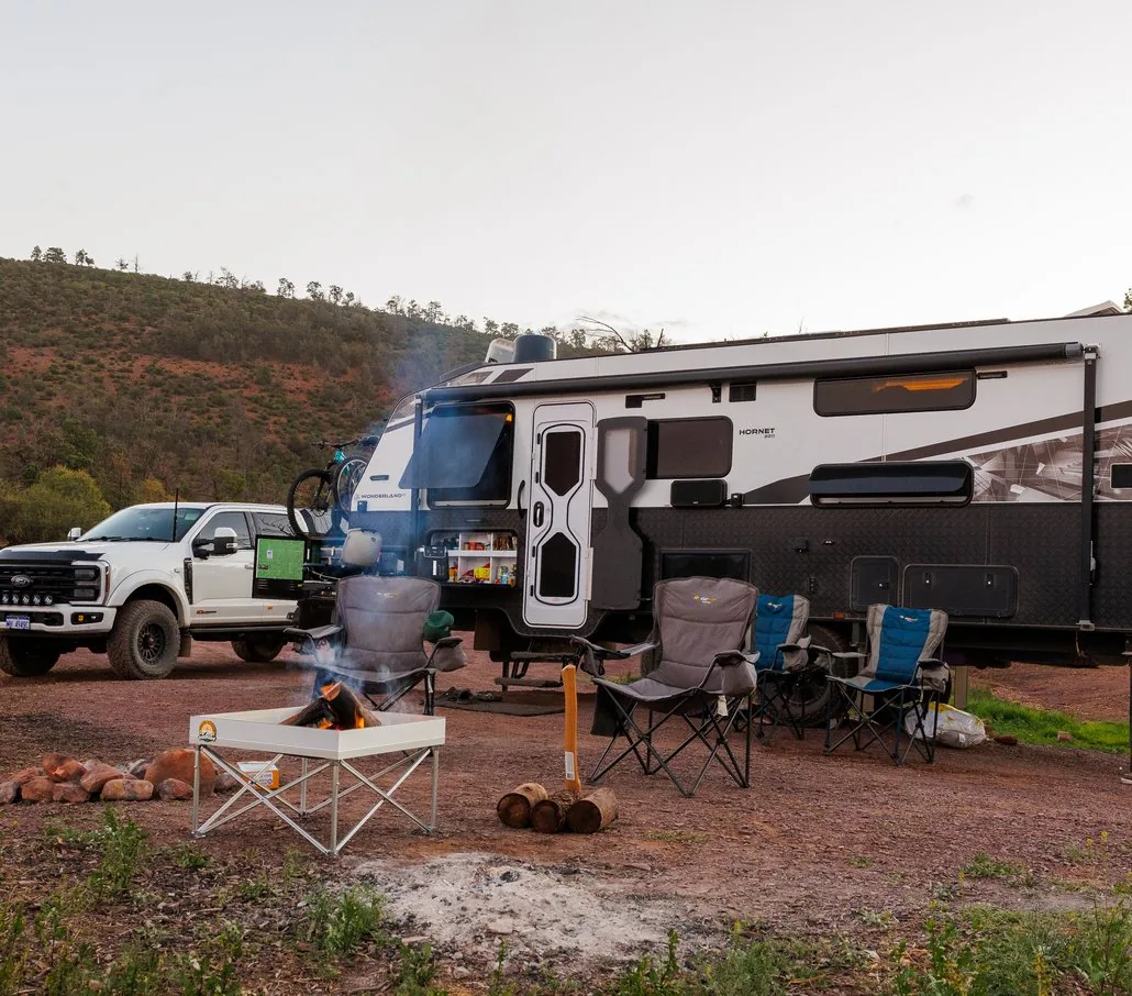 The Kiwi Van Life&rsquo;s Wonderland RV Hornet set up at a bush camp