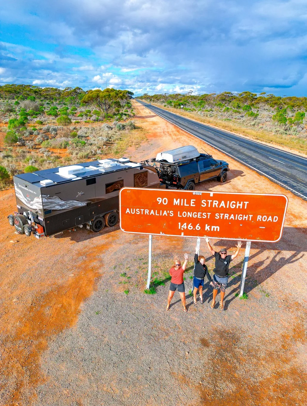 The Wheatland Wanderers at the 90 Mile Straight sign